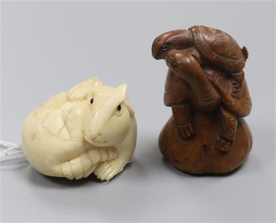 Two signed netsuke (one ivory, the other wood)